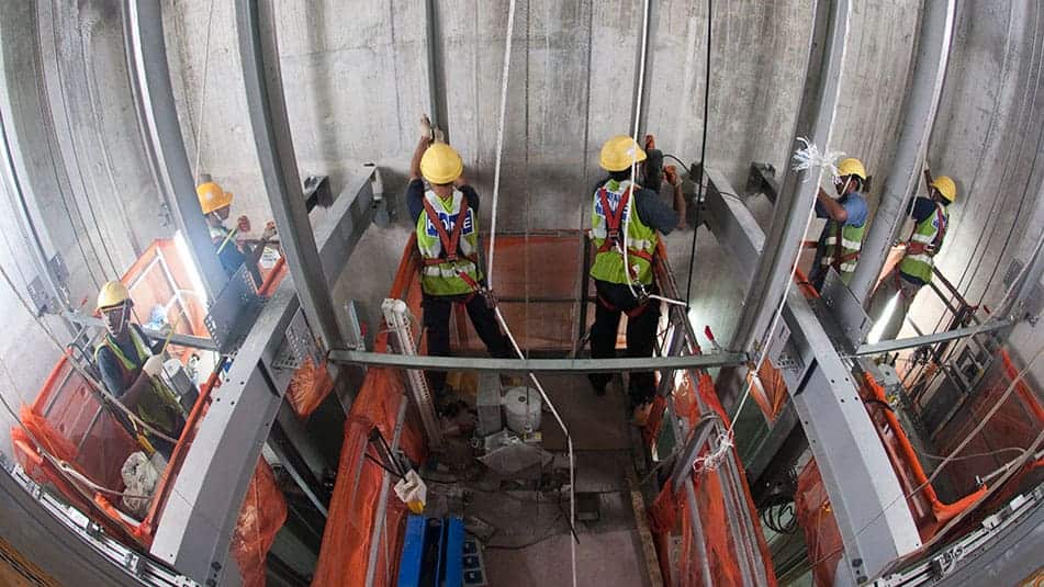 Innovations like the KONE JumpLift construction time elevator are speeding up the flow of people and materials on site.